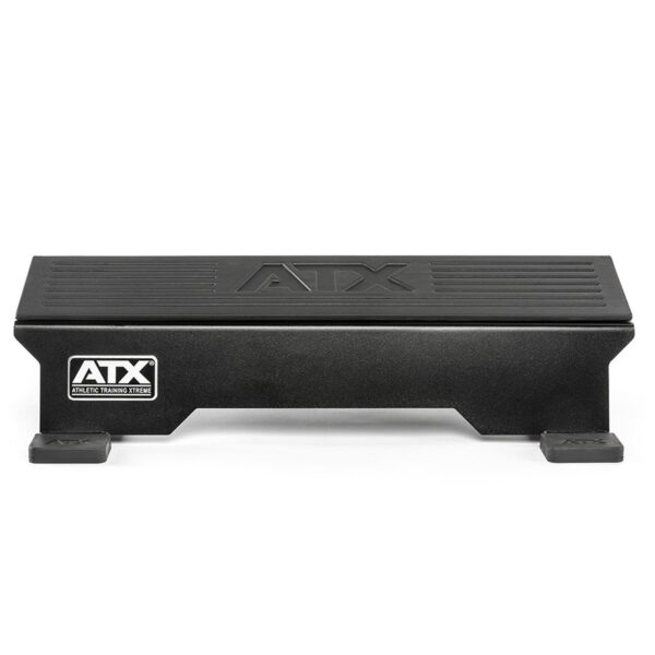 The ATX® Calf Block is a black athletic training step with a grooved surface and small rectangular feet, ideal for fitness routines. The ATX logo is on the side and top. It doubles as a calf block, perfect for targeted exercises and enhanced workouts.