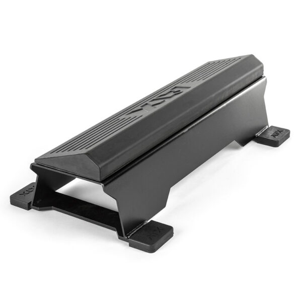 The ATX® Calf Block is a black metal ramp with grooved details and flat, wide feet for stability. It is slightly elevated at the center, offering heavy-duty support, making it perfect for use with vehicles or equipment.