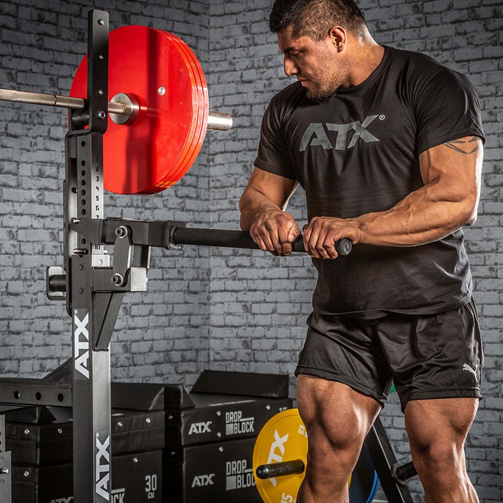 Man adjusting a competition bench press