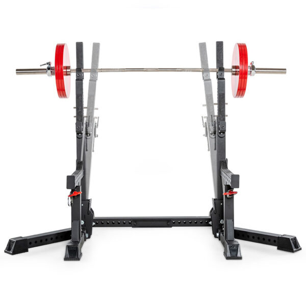 The ATX® Competition Combo Rack holds a loaded barbell with red weight plates. This sturdy, adjustable rack is ideal for weightlifting exercises, set against a white background to highlight the gym equipment.
