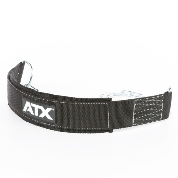 A black ATX® Nylon Dip Belt with stitching details and a metal buckle sits against a white background, its design reminiscent of a durable weightlifting accessory. The ATX logo is prominently displayed on the front.