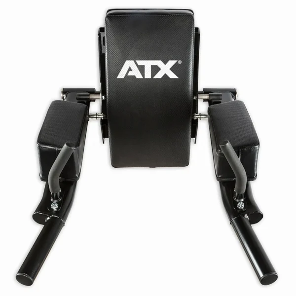 Introducing the ATX® Wall Mounted Knee Raise & Dip, featuring a sleek black design with padded back and arm supports. The ATX logo stands out in white on the backrest. Its extended bars provide stability, while visible handle grips make it perfect for leg raises and dips.
