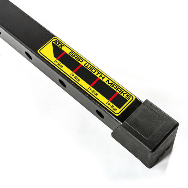 An ATX® Dip Station barbell in black features convenient grip width marks, making it an ideal match for your dip station setup. The yellow label highlights grip widths of 1.50m, 1.60m, 1.65m, and 1.80m alongside color-coded sections for easy identification. The bar includes evenly spaced holes and is finished with a square cap on one end.