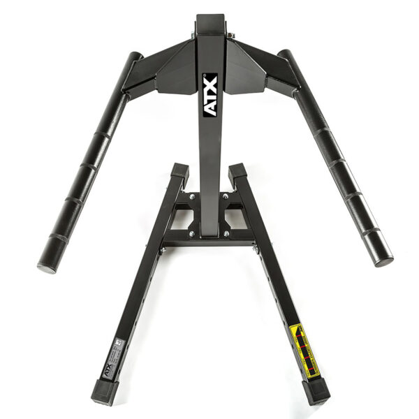 Seen from above, the ATX® Dip Station, a black workout machine equipped with angled parallel bars for strength training exercises, is featured against a white background with branding displayed on its central column.