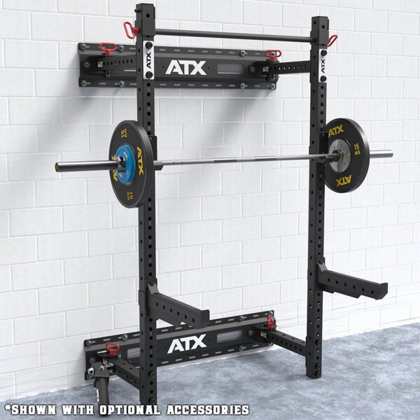 A sleek black wall mount squat rack is installed on a white brick wall. It boasts a barbell with weights and adjustable supports, perfect for strength training. The note at the bottom reads Shown with optional accessories.