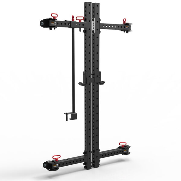 A black, wall-mounted squat rack with adjustable arms and multiple holes for customization. Red clips and a hanging accessory are attached. The minimalist design allows for various strength training exercises, making it an ideal folding squat rack solution for compact spaces.
