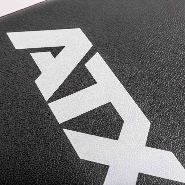 Close-up of a black textured surface similar to the ATX® Flat Bench PRO, with the words ALYX in bold white angular text.