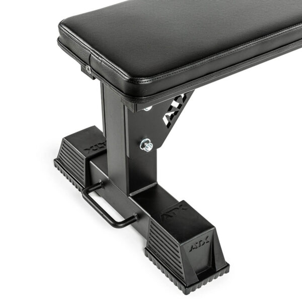 Close-up of the ATX® Flat Bench, a sleek black and silver design featuring a padded seat on a sturdy metal base with handle, displaying ATX branding.