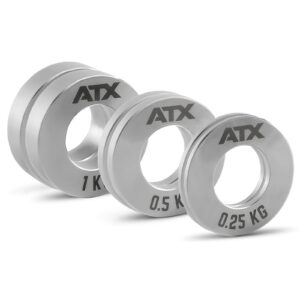 The ATX® Olympic Mini Fractional Plate Set features three circular silver plates branded with ATX, labeled 1 kg, 0.5 kg, and 0.25 kg, displayed in descending size order, each with a large central hole.