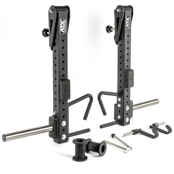 The ATX® Jammer Arms are two adjustable black metal gym hooks featuring multiple holes, pins, and attachments for secure mounting. The kit includes rods, brackets, and smaller components for assembly. Ideal for use with weightlifting equipment.