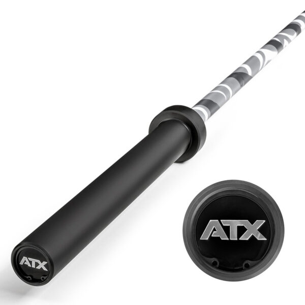 A close-up of the ATX® Olympic Camo Power Bar showcases its black and gray camo-patterned shaft, with the endcap displaying the bold ATX logo.