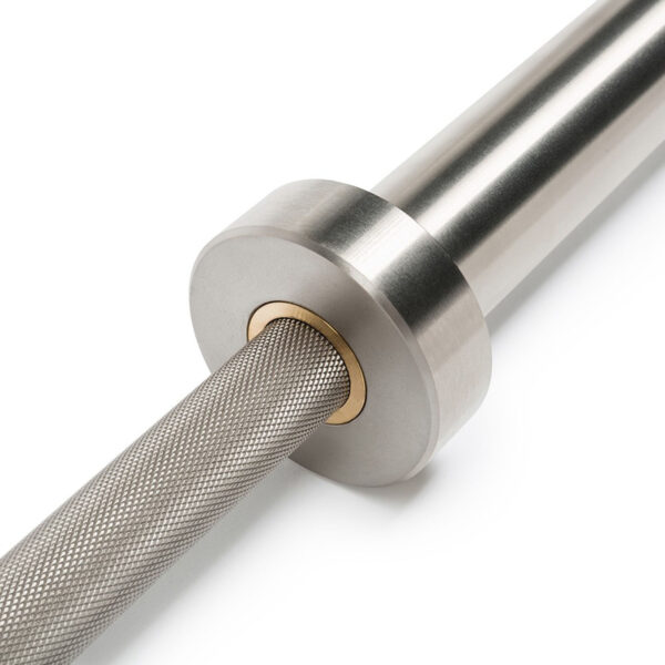 Close-up of the ATX® Competition Powerlifting Barbell with a textured grip and metallic finish. It features a smooth cylindrical end, showcasing its robust and sleek design, perfect for heavy lifting.