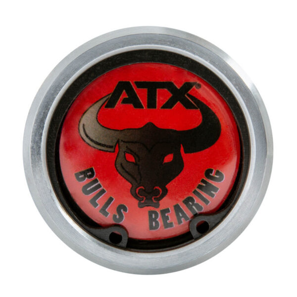 Circular object with a silver metallic rim and red center featuring a black bull head logo. The text ATX appears on top and BULLS BEARING at the bottom, with two small holes nearby.