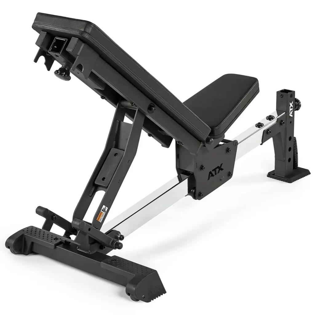 The ATX® Multi Bench features a black padded seat and backrest on a sturdy metal frame. Adjustable angles on the seat and backrest accommodate various exercises, while wide rubber feet ensure stability on different surfaces.