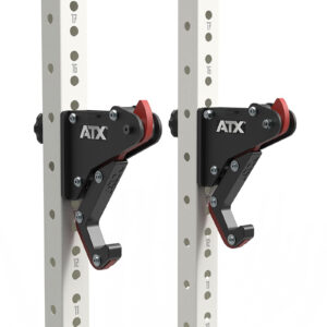 Close-up image of two ATX® PRX Monolift black and red safety bar catchers attached to a white fitness rack with numbered holes for adjustable height settings.