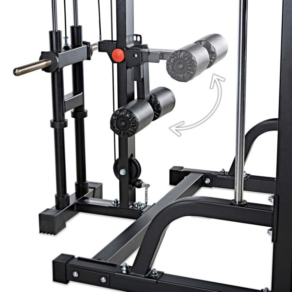 Close-up of the ATX® Smith Machine System Plate Loaded, showcasing padded rollers, a black metal frame, and an adjustable lever with a red knob. An arrow indicates movement direction with the floor visible beneath.