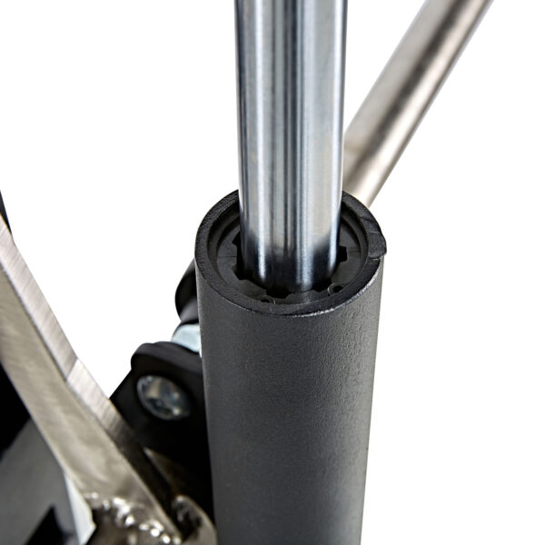 Close-up of the ATX® Smith Machine Half Rack showing the metal telescopic pole extending from its cylindrical base, surrounded by bolts and a hinge mechanism, with a sleek black coating on the base.