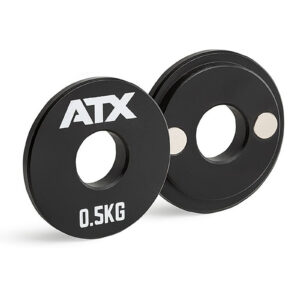 A pair of sleek, black ATX® Magnetic 0.5kg single weights featuring ATX and 0.5KG printed on them, each with a circular cutout in the center.