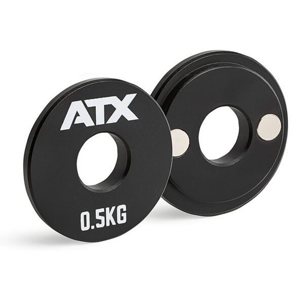 A pair of sleek, black ATX® Magnetic 0.5kg single weights featuring ATX and 0.5KG printed on them, each with a circular cutout in the center.