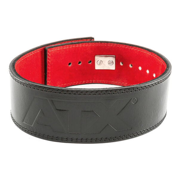 The ATX® Lever Leather Powerlifting Belt is crafted from black leather with a red interior lining and features the embossed letters ATX on the outside. It includes multiple adjustment holes and a robust metal buckle for secure fit.