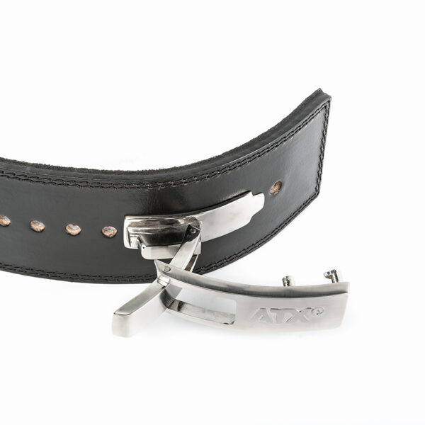 The ATX® Lever Leather Powerlifting Belt is displayed, featuring a sleek black leather design and a silver metal latch buckle. It boasts multiple adjustment holes and neatly stitched edges, with the partially open latch showcasing its modern style.