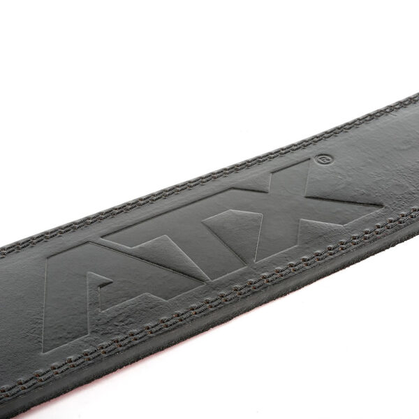 Close-up of the ATX® Lever Leather Powerlifting Belt in black leather, embossed with the letters ATX. The belt showcases detailed stitching along the edges against a plain white background.