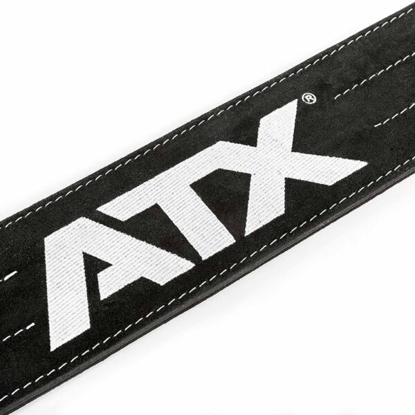 Close-up of the ATX® Suede Power Belt in black, showcasing bold white ATX lettering and visible white edge stitching.