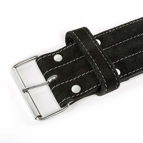 Close-up of the ATX® Suede Power Belt, featuring a black leather design with white stitching and a silver metal buckle. The belt includes metal rivets and a loop near the buckle, with leather that appears to have a slightly rough texture.