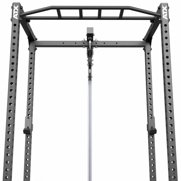 The ATX® Power Rack 520 215cm System Plate Loaded is a black rack with a pull-up bar and adjustable holes for height customization, shown from a low angle against a white background to emphasize its sturdy design.