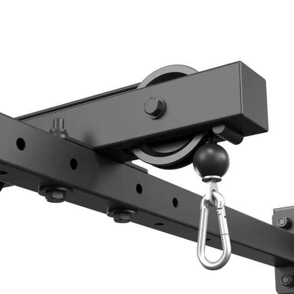 A close-up of the ATX® Power Rack 520 215cm System Plate Loaded showcasing its black metal pulley system with a carabiner. Designed for mounting, it features a simple yet sturdy build with multiple bolts and round openings for adjustments.