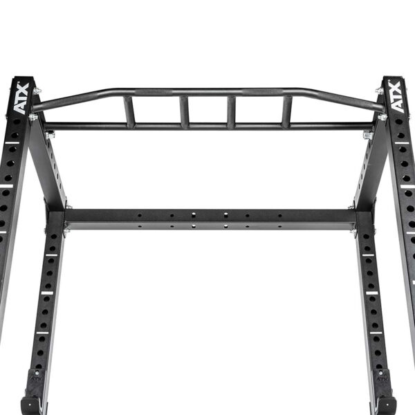 The image features a detailed view of the ATX® Power Rack 610 195cm for Low Ceilings, showcasing a black metal pull-up bar with multiple grip variations and perforated vertical supports.