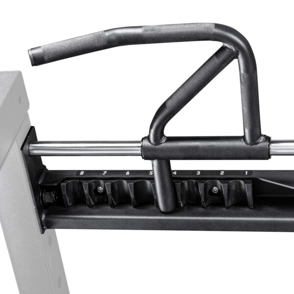 Close-up of the ATX® 750 Indexing Chin Up with a black multi-grip pull-up bar attachment on a metal frame, featuring adjustable numbered settings. The sleek, industrial design suggests it’s for weight training exercises.