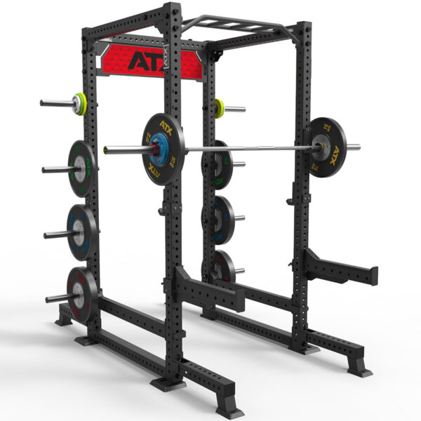 The ATX® Power Rack 840 is a black metal squat rack with multiple weight plates and a barbell. It features side-mounted weight storage pegs, a pull-up bar at the top, and stands against a plain white background.
