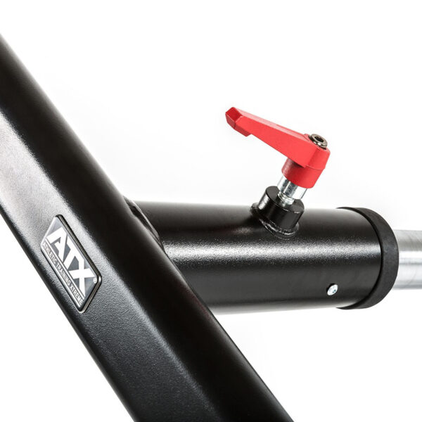 Close-up of the ATX® Revolving Handle Attachment, featuring a sleek black metal design. A red adjustable lever is connected to a cylindrical component for easy positional adjustments, showcasing a modern aesthetic.