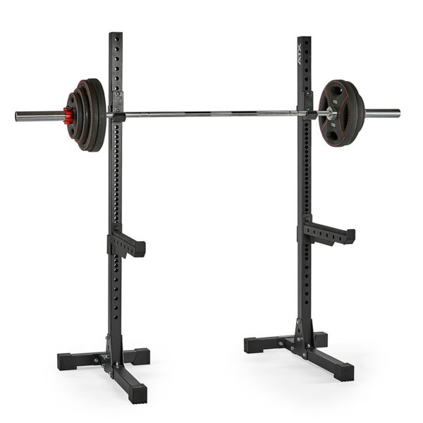 The ATX® Squat Stands 650 SD are crafted from durable black metal, featuring adjustable height and two supportive arms for stability, designed to hold a barbell loaded with weight plates on both sides.