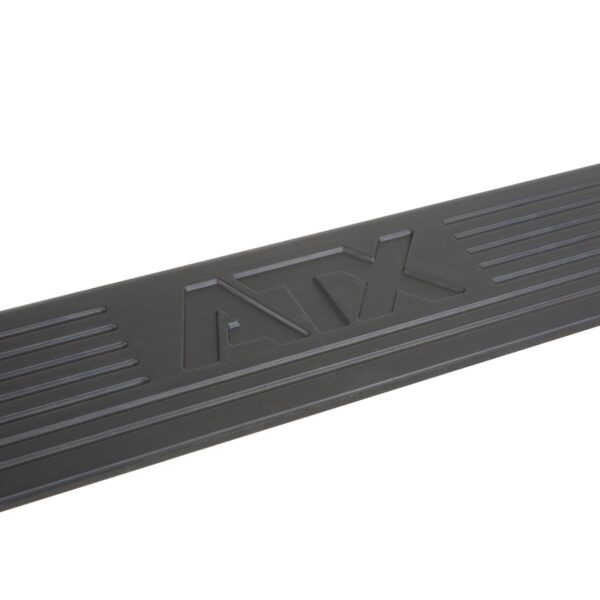 Close-up of a black barbell with the logo ATX embossed in the center, perfectly complementing your squat wedge block. The surface has grooves on each side of the logo.