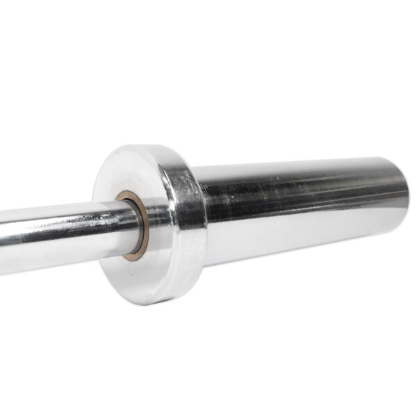 A close-up of the Power Maxx 4ft Olympic Barbell sleeve shows its shiny metallic surface reflecting light, with a circular groove at the inner end for weightlifting plates, emphasizing its polished finish.