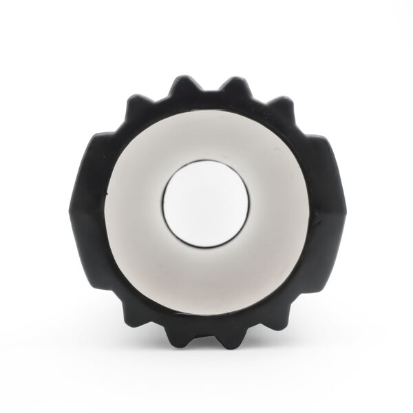 The image features a Power Maxx EVA Foam Roller, black and gear-shaped, with a white circular interior, set against a plain white background.