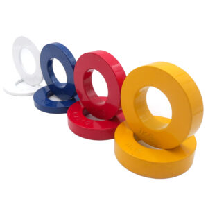 The Power Maxx Olympic 5kg Fractional Plate Set includes five colorful plates—white, black, blue, red, and yellow. Each plate has a central hole for a barbell and is displayed in a curved line with visible weights for precise workout adjustments.