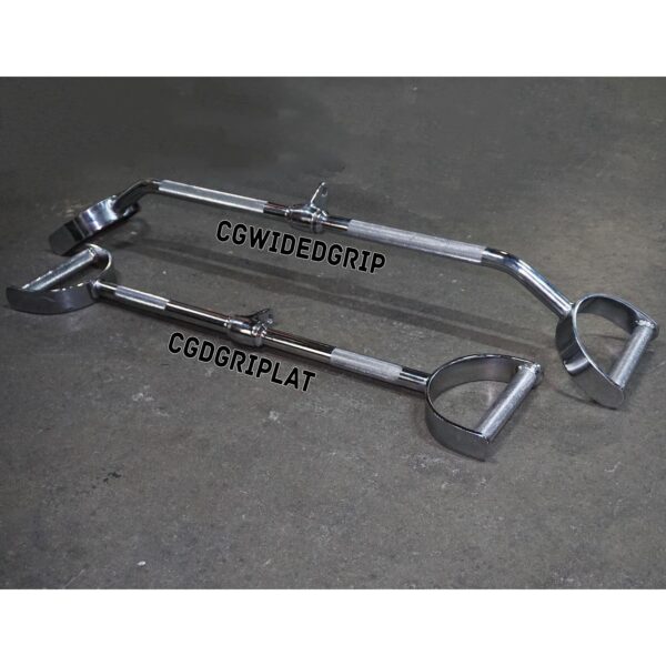 Two chrome steel gym handles with circular grips are placed on a concrete floor. One is labeled CGWIDEGRIP for the Wide D Grip Pulldown Bar, and the other CGDGRIPLAT, indicating different grip types for exercise equipment.