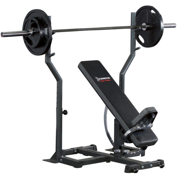 The Ironmaster Barbell Attachment includes an adjustable incline bench and barbell with weight plates. The black bench features a metal frame, and the barbell is positioned on a rack above.