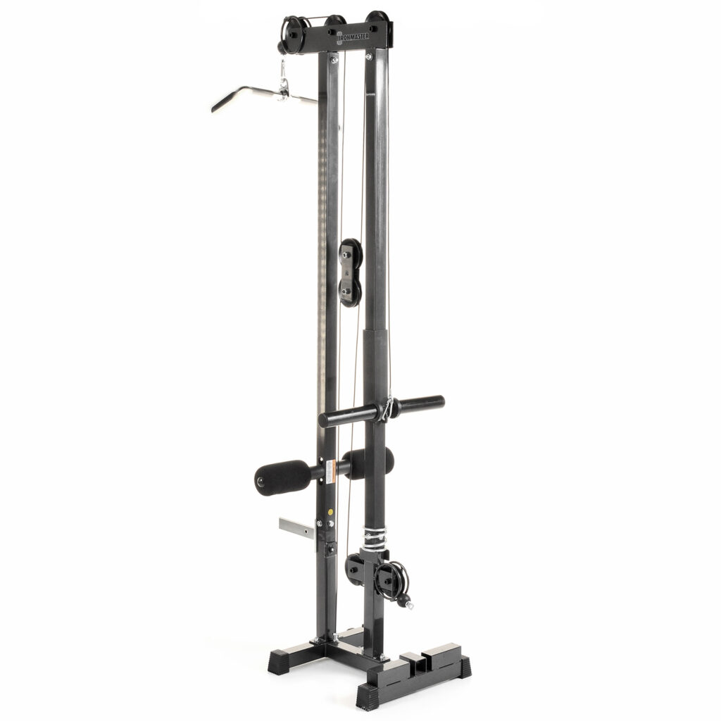 The Ironmaster Cable Tower Attachment V2 is a tall, black strength training machine with pulleys and cables. It includes a central column and attachments for exercises like lat pull-downs and seated rows, all set on a sturdy black base.