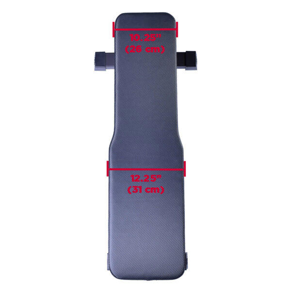 Top view of the Ironmaster Hybrid Bench Pad in black with a textured surface, showing red-marked measurements: top section at 10.25 inches (26 cm) and bottom at 12.25 inches (31 cm), featuring stylish functional side extensions.