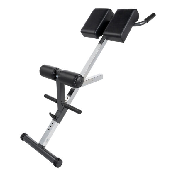 The Ironmaster Hyper Core Attachment is a hyperextension workout bench with black padded cushions and a sturdy metal frame, featuring adjustable settings and support handles for stability during exercises.