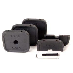 Four black plates labeled 7.5 LB and 3.4 KG, two pins, and an Allen wrench are neatly arranged with Ironmaster Heavy Handle Kit dumbbells on a white background.