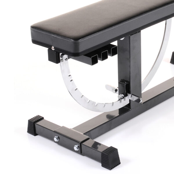 Close-up of the Ironmaster Super Weights Bench showcases its padded black seat, sturdy metal frame, and secure locking mechanism. Its base has rubber feet for stability, emphasizing the precision of seat corners and adjustment details.