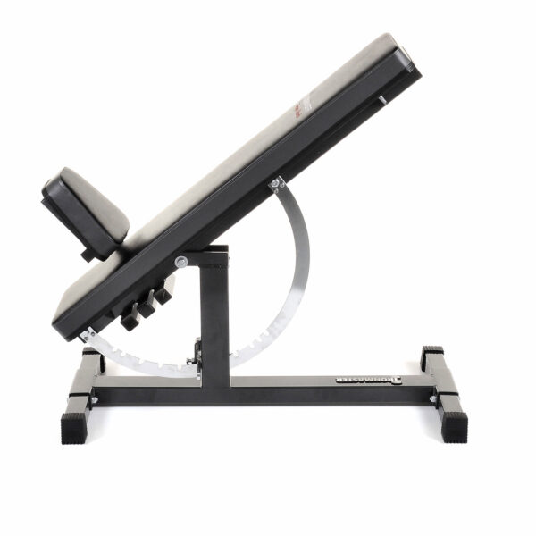 The Ironmaster Super Weights Bench features a padded seat and backrest with adjustable inclines, visible metal frame notches for different angles, and sturdy black legs with rubber feet.