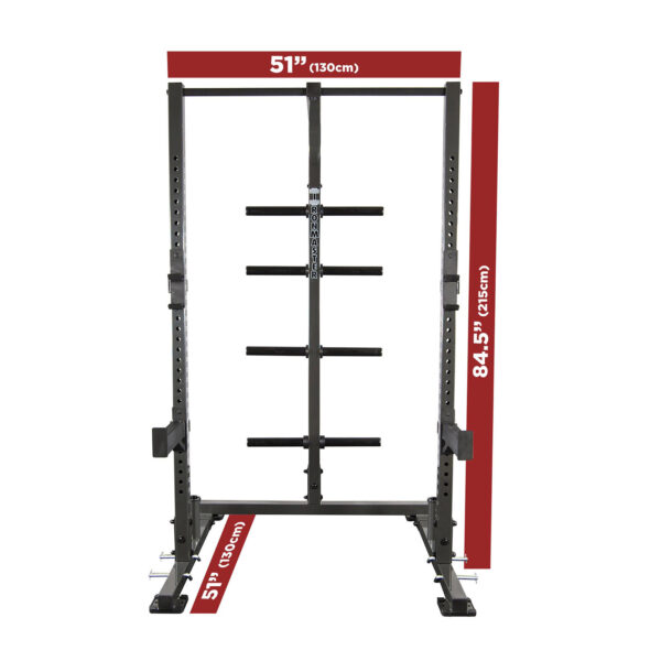 Image of the IM1500 Ironmaster Half Rack, featuring dimensions: 51 inches wide (130 cm), 84.5 inches tall (215 cm), and a base depth of 51 inches (130 cm). It includes multiple support bars and weight storage pegs on the side.