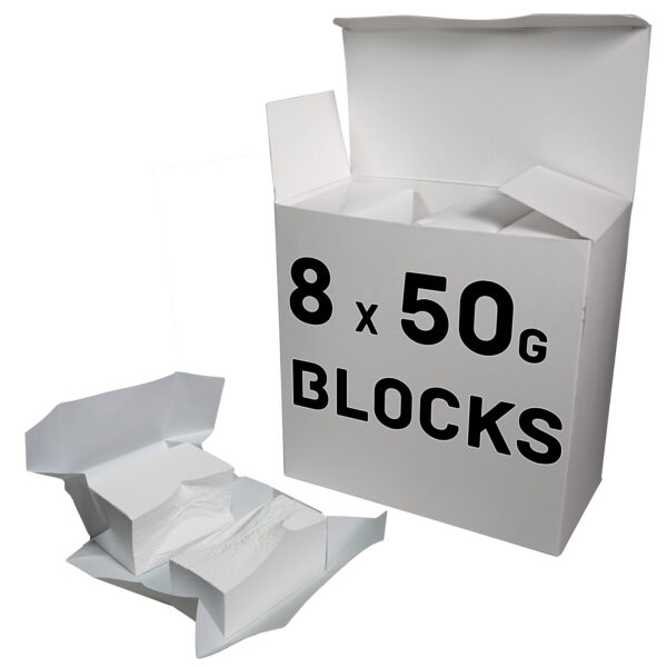 A large white chalk box labeled 8 x 50g Blocks sits with its lid open. Two smaller opened packages reveal white powder blocks perfect for gym chalk use, placed in front of the box.