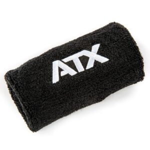 The Kettlebell Wrist Guard is a soft, absorbent black wristband with ATX embroidered in white, ideal for athletic use.